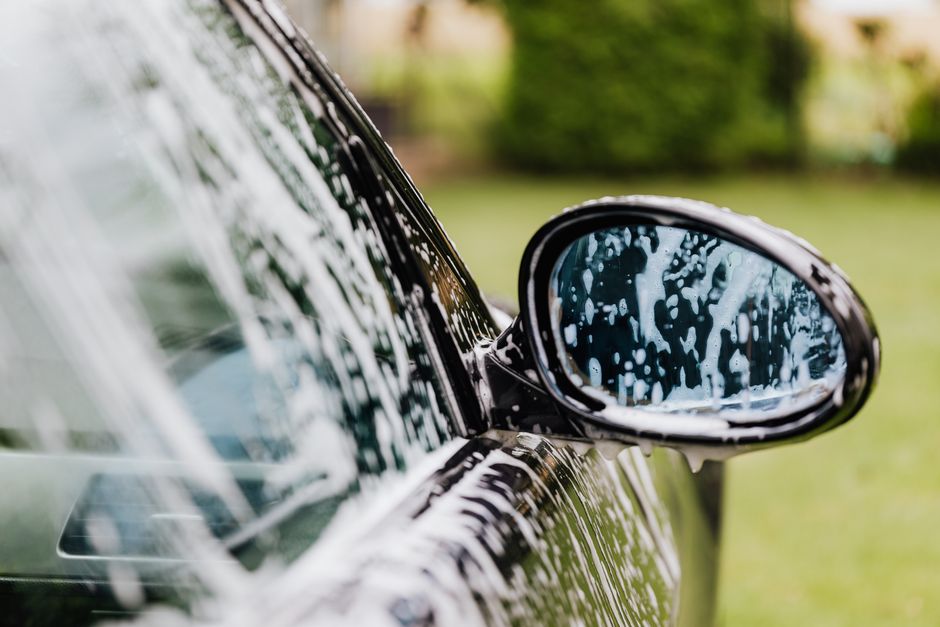 Thick foam applied during a premium hand car wash